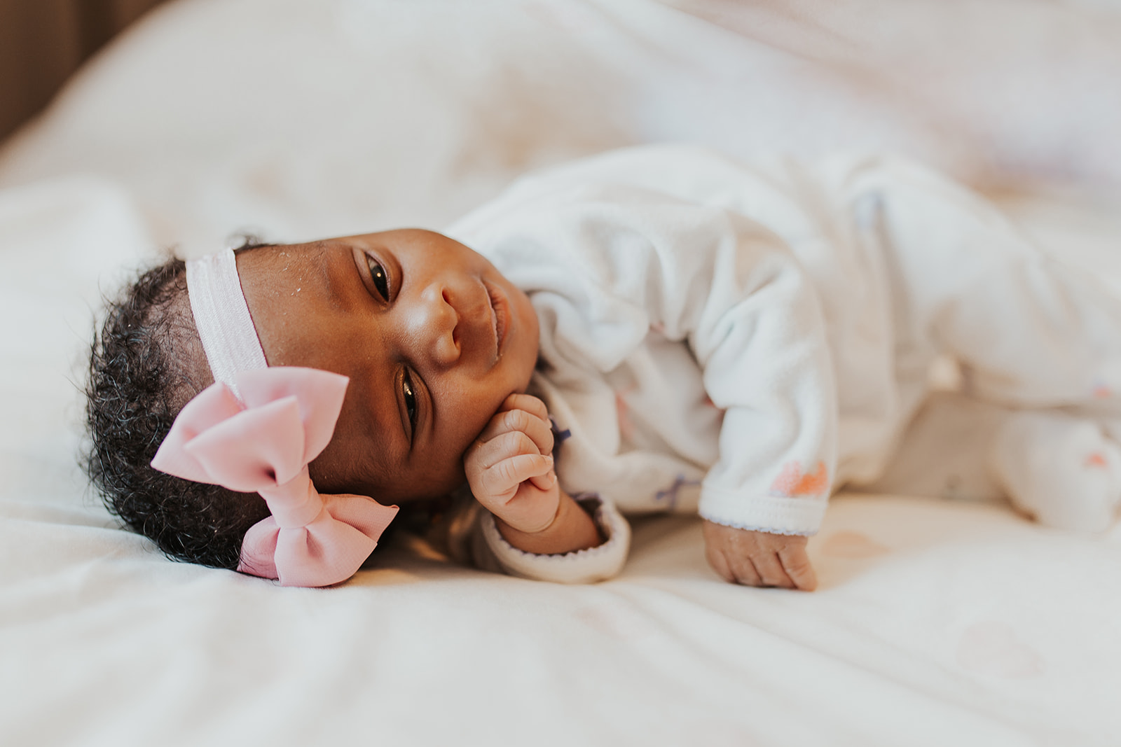 Newborn Baby Girl with Pink Bow