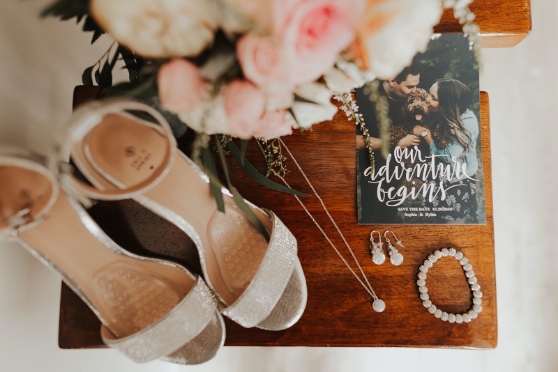 the perfect flatly of shoes jewelry invitations and bridal bouquet
